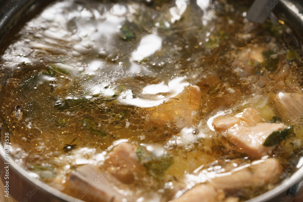 prepared hot trout soup with potatoes in pot prepared hot trout soup with potatoes in pot