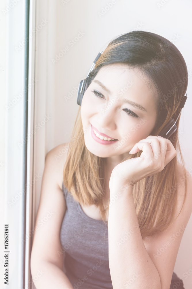 beautiful Asian Woman enjoy happy and laught Cheerful with headphone Portrait Concept beautiful Asian Woman enjoy happy and laught Cheerful with headphone Portrait Concept