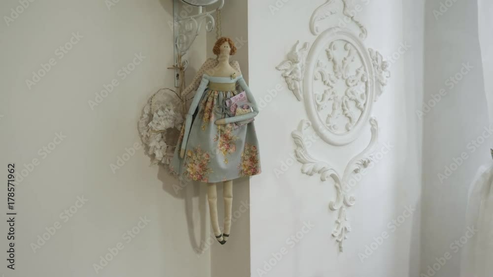 Camera movement from the doll hangs on the clock on the wall Camera movement from the doll hangs on the clock on the wall