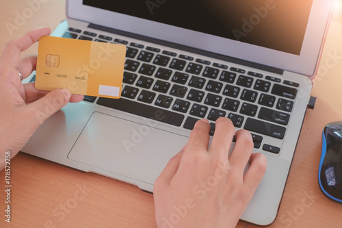 Hand holding a credit card ...