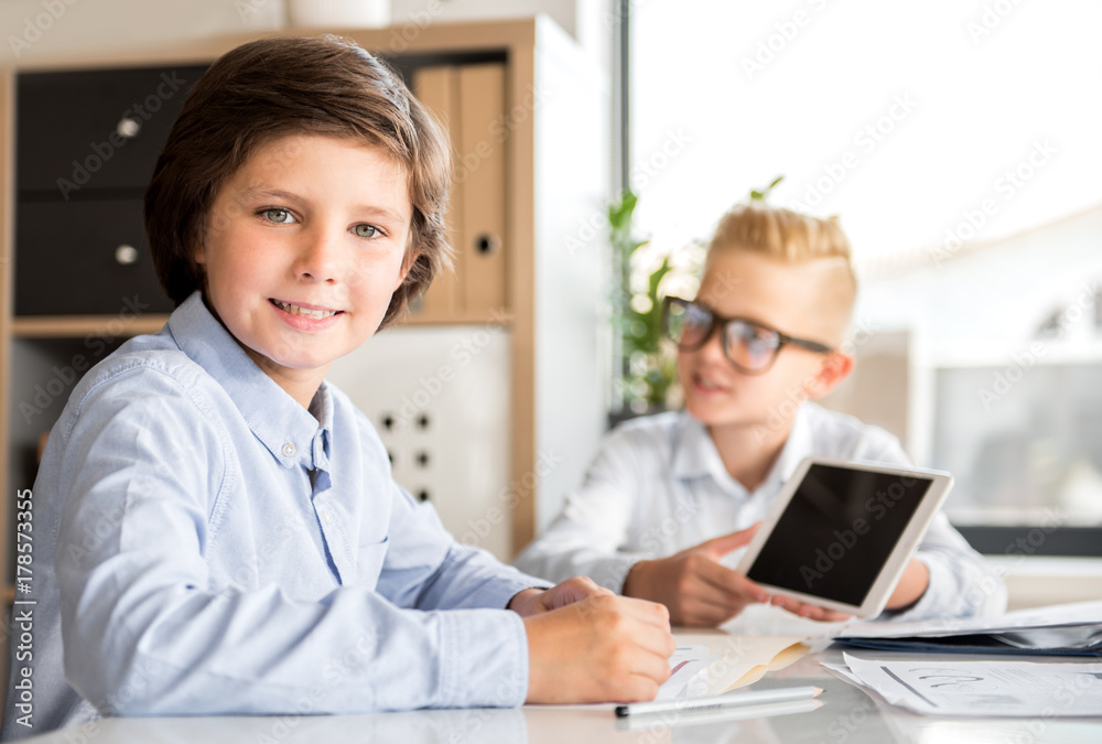 Delightful children are working with pleasure Delightful children are working with pleasure