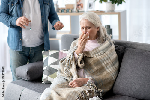 Senior lady having runny nose