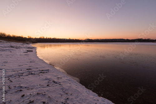 powdered by the first snow at sunset