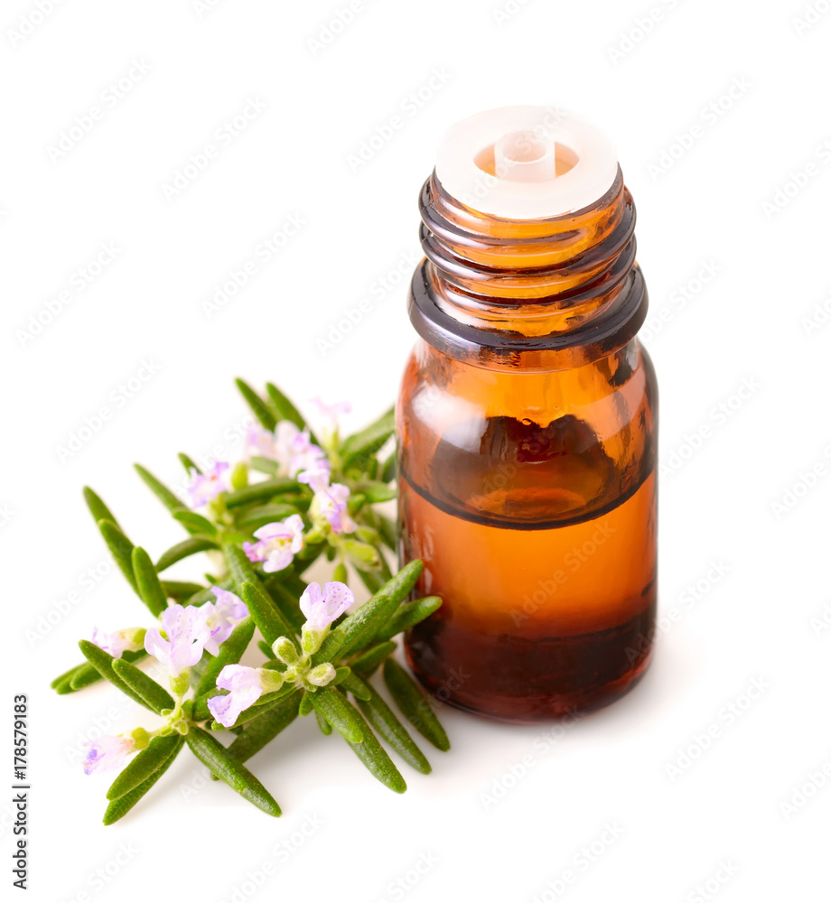 Rosemary essential oil isolated on white Rosemary essential oil isolated on white