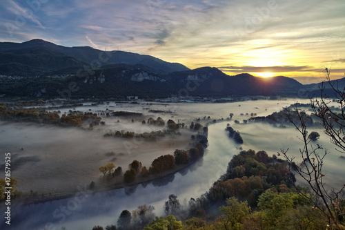 View of the Adda river during a foggy morning, Airuno, Italy