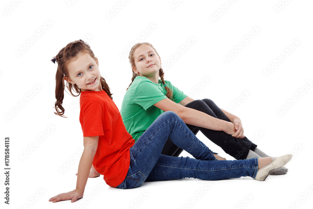 Two happy teenage girls isolated on white background Two happy teenage girls isolated on white background