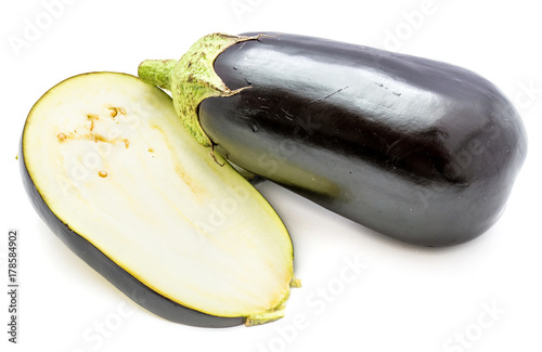 One whole eggplant (aubergine) and one slice isolated on white background