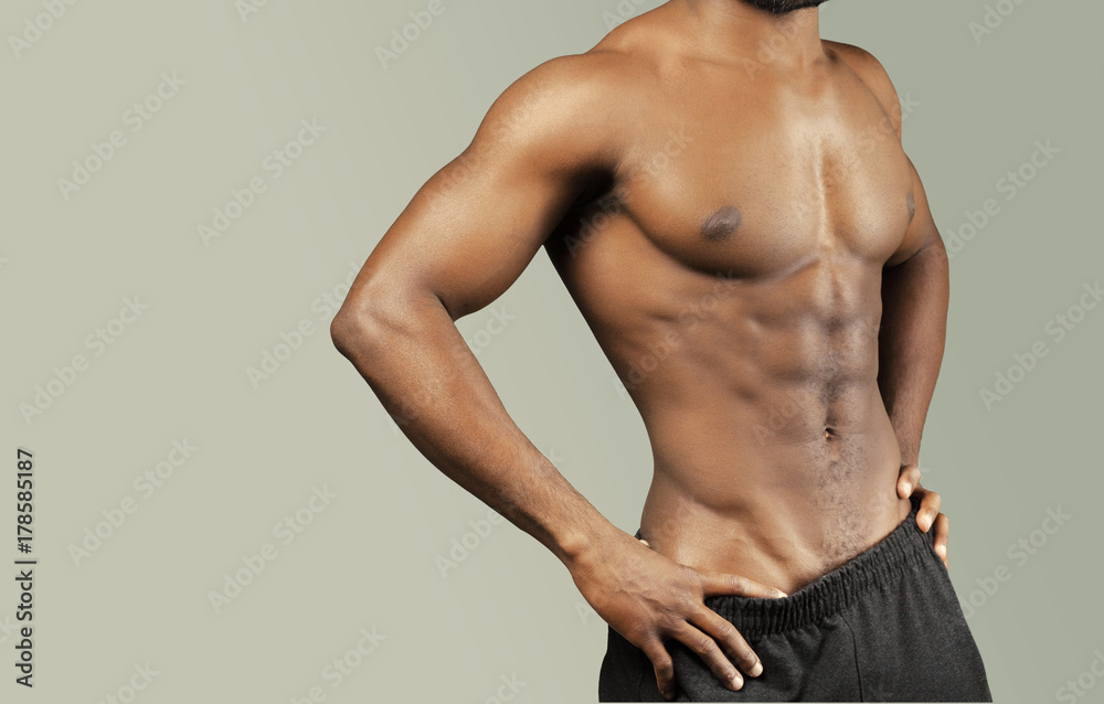 Fototapeta premium Close-up photo of afro american musculary young man