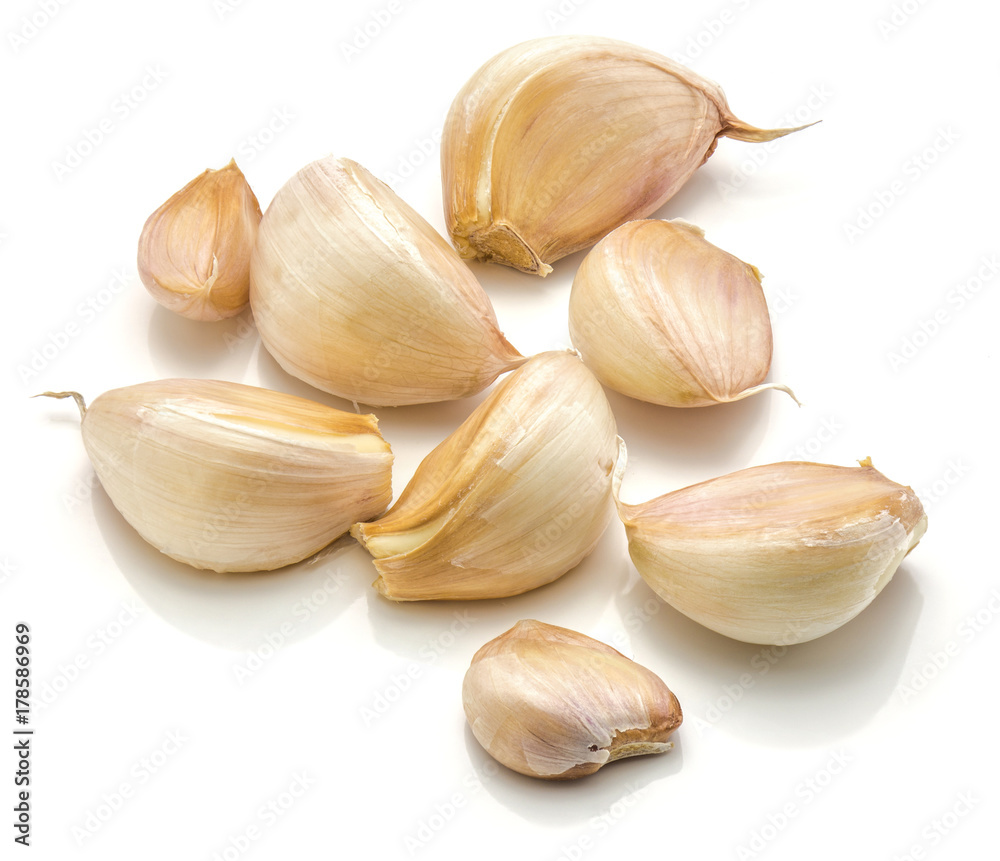Garlic cloves isolated on white background separated