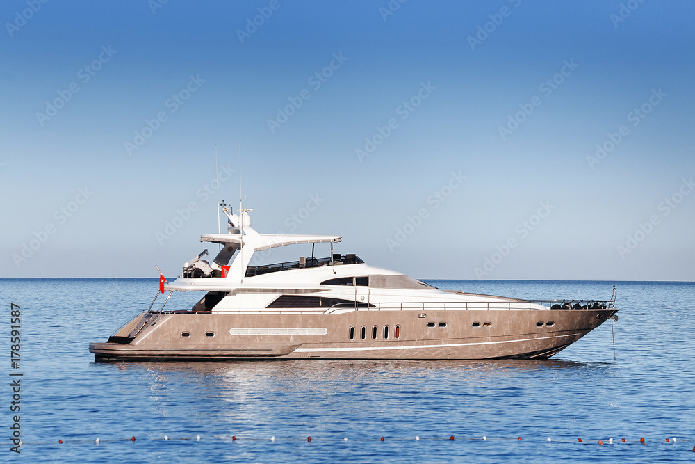 Luxury white yacht sailing in Mediterranean azure sea