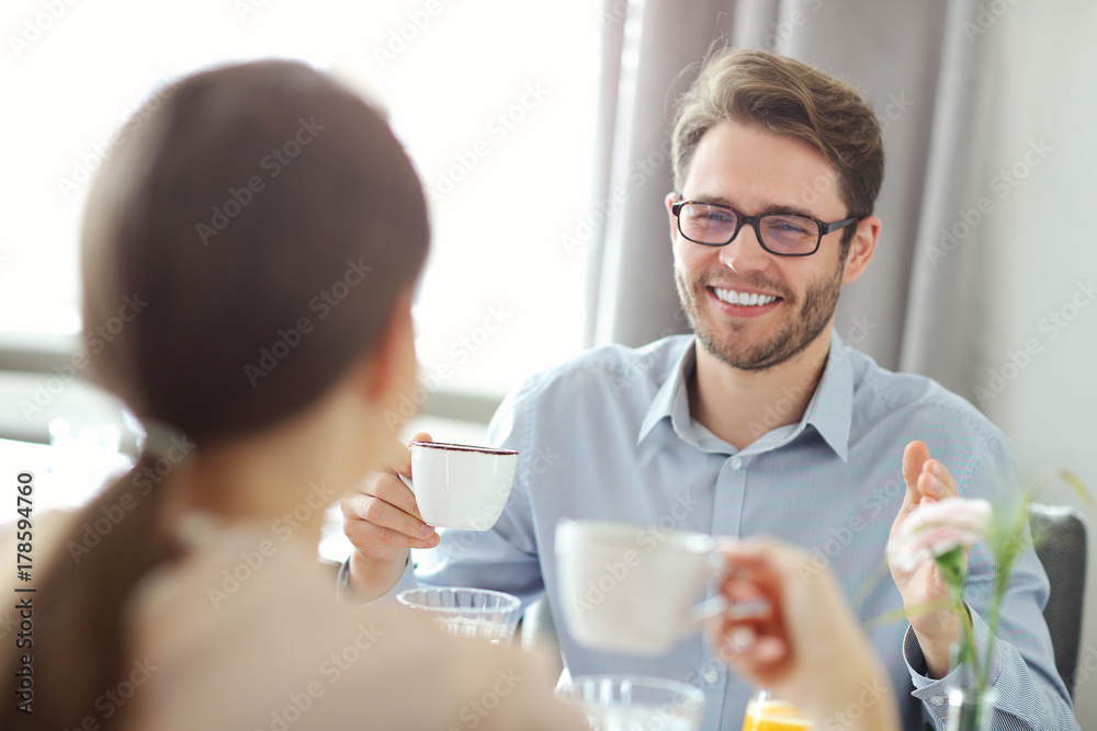 Two Businesspeople Meeting For Lunch In Restaurant Two Businesspeople Meeting For Lunch In Restaurant