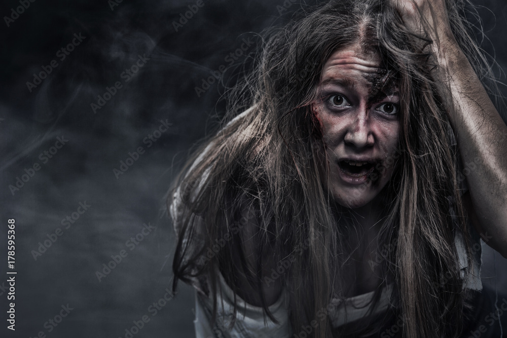 Zombie woman, Horror background for halloween concept and book cover. Copy space.