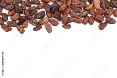 unpeeled cocoa bean isolated on white background with copy space for your text. Top view