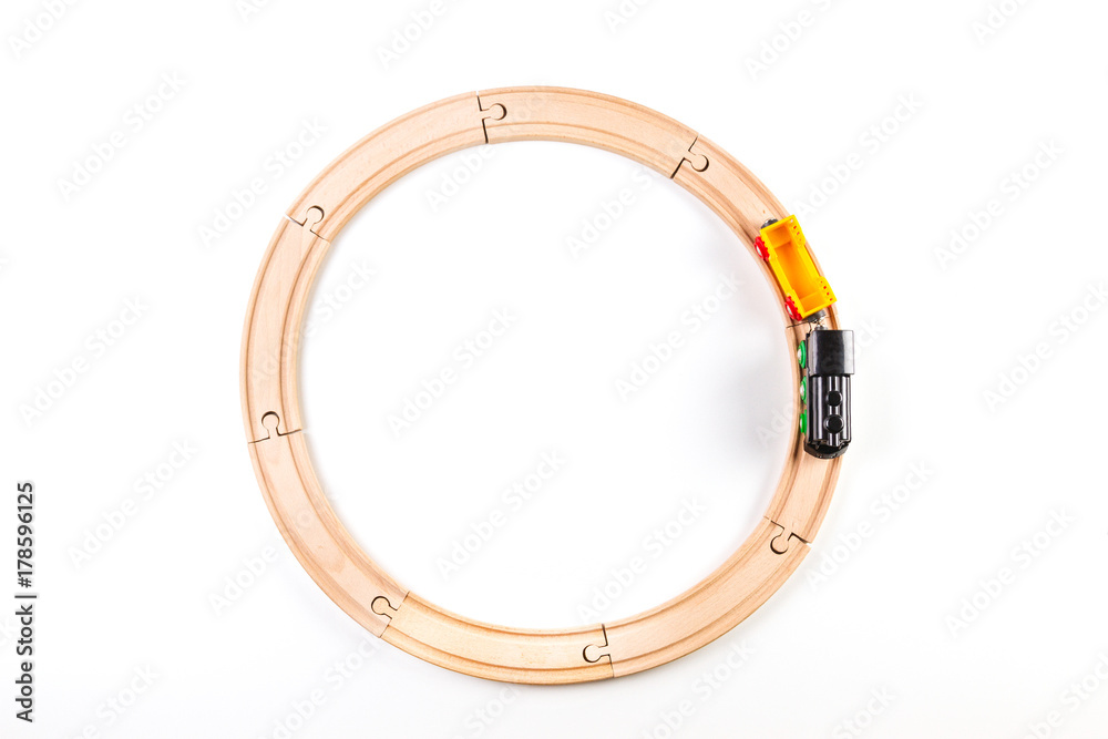 Toy train on round wooden railways Toy train on round wooden railways