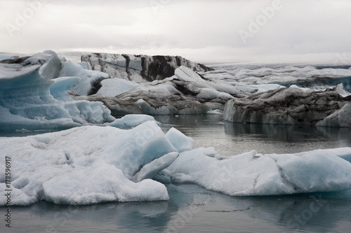 Panoramic Jokulsarlon, Typical Icelandic landscape, a wild nature of seals and icebergs, rocks and water. © RiCi