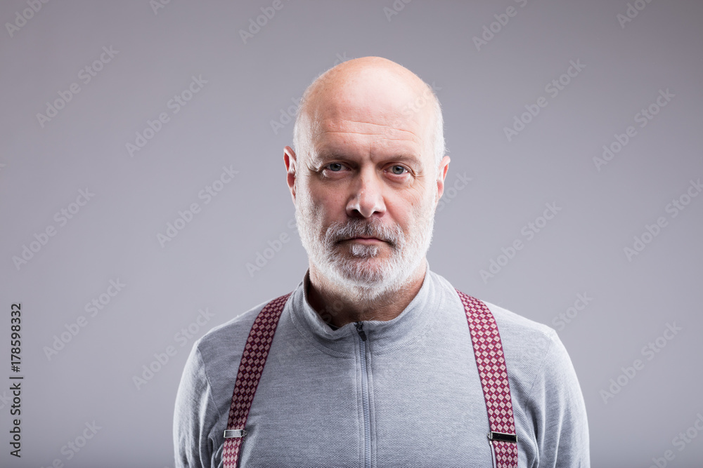 Fototapeta premium portrait of a serious old man