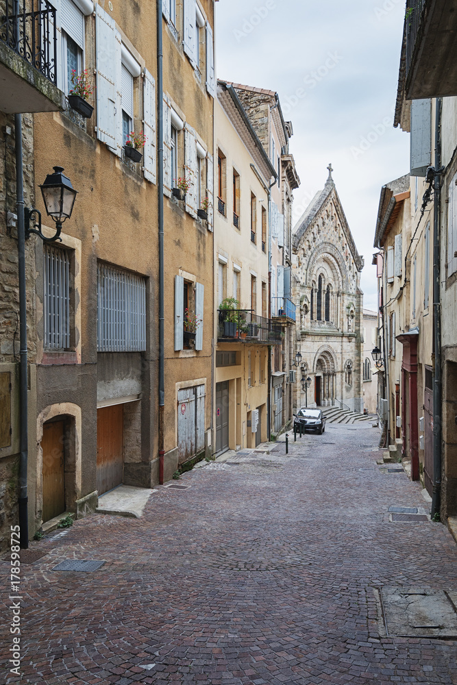 Street leading to Saint Laurent Church in Aubenas  in France