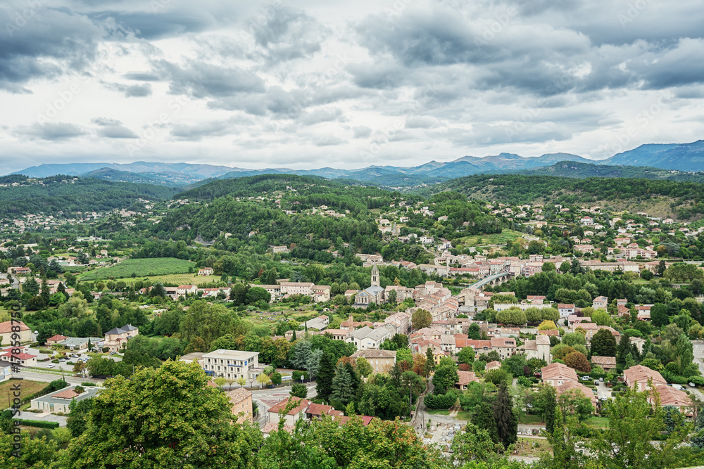 Panorama on the city of Aubenas in the Ardeche region in France with in the background the Ardeche mountains