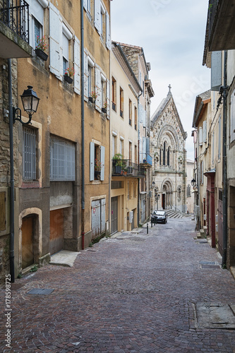 Street leading to Saint Laurent Church in Aubenas  in France © julia700702