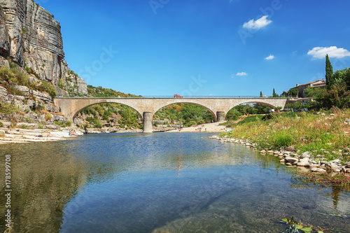 The bridge over the River Ardeche near the old village Balazuc in the Ardeche region of France