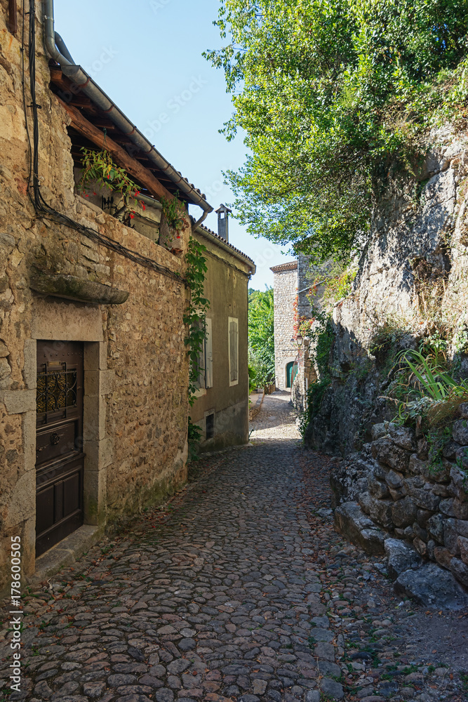 The narrow street in the picturesque village of Labeaume in the Ardeche region of France The narrow street in the picturesque village of Labeaume in the Ardeche region of France