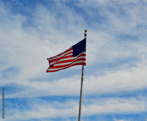 American flag against blue sky