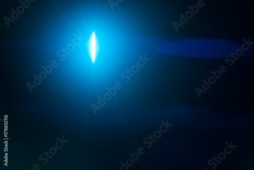 The blue light on the dark background. anamorphic lens shot photo