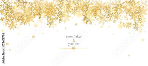 card with golden snowfakes on white