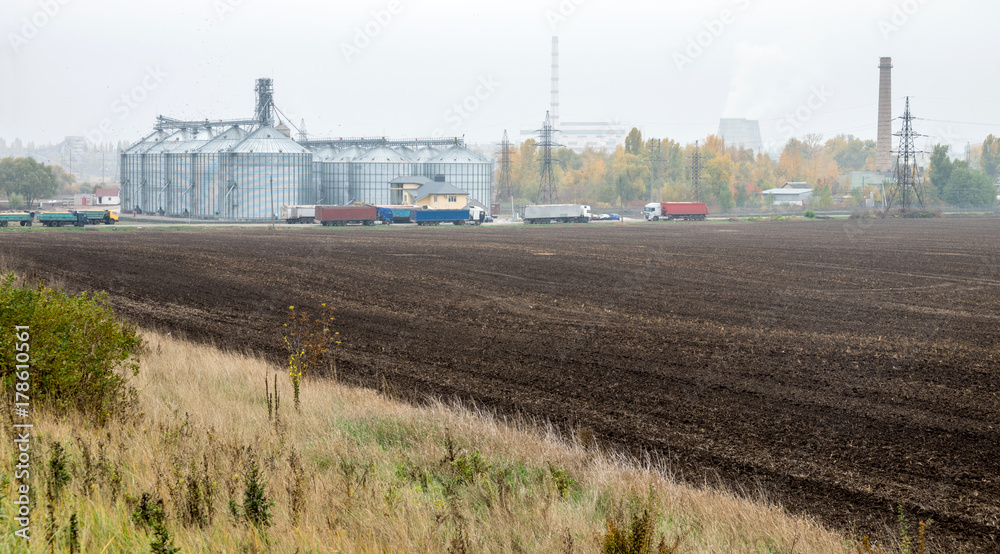 Fototapeta premium Elevator for grain storage. Grain dryer. Agricultural complex. .