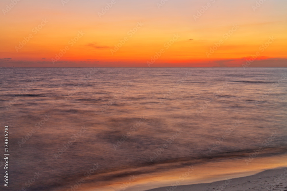 Tropical beach at sunset.