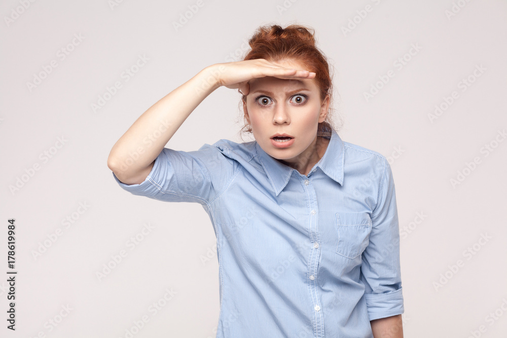 Dont see. Where are you? Emotional foxy woman looking at camera with surprised face. Dont see. Where are you? Emotional foxy woman looking at camera with surprised face.