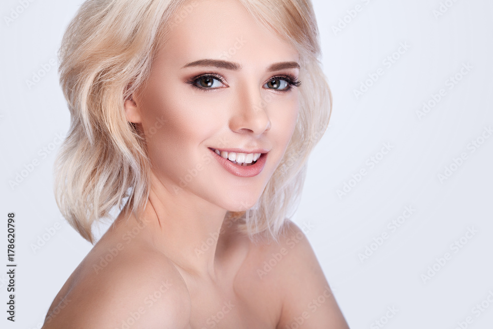 Beautiful Woman Face Portrait. Female Touching Skin Under Eyes Beautiful Woman Face Portrait. Female Touching Skin Under Eyes