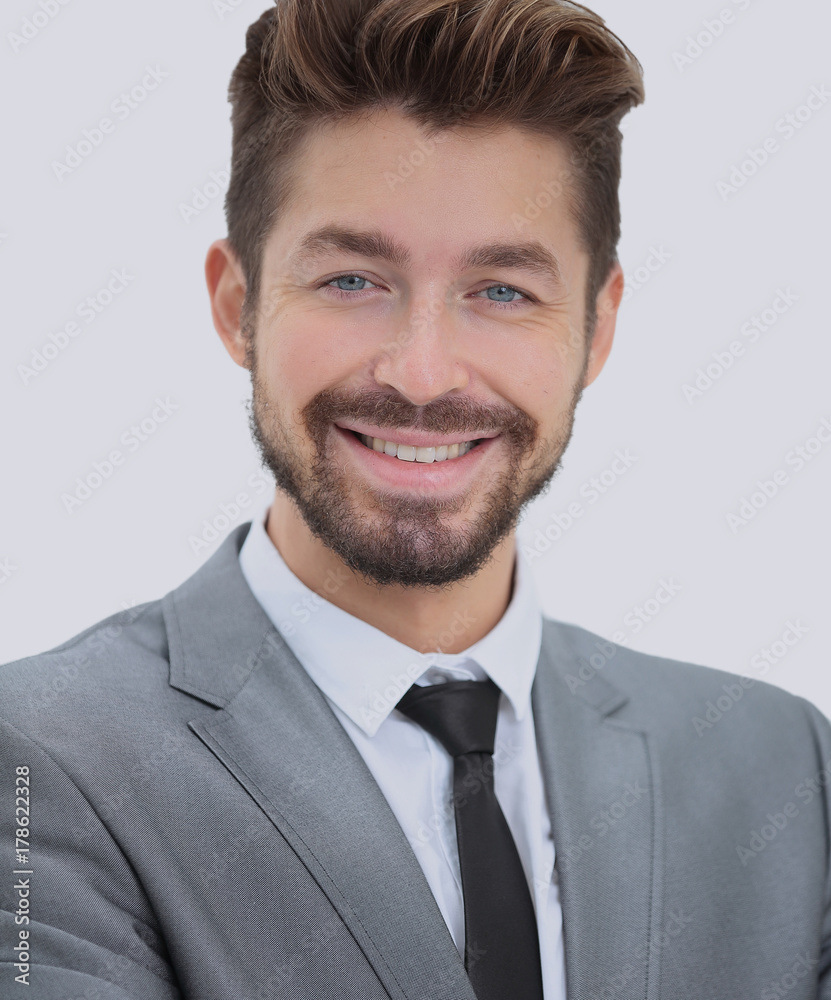 Close up portrait of a smiling handsome business man over white Close up portrait of a smiling handsome business man over white