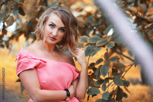 Beautiful girl in the autumn park