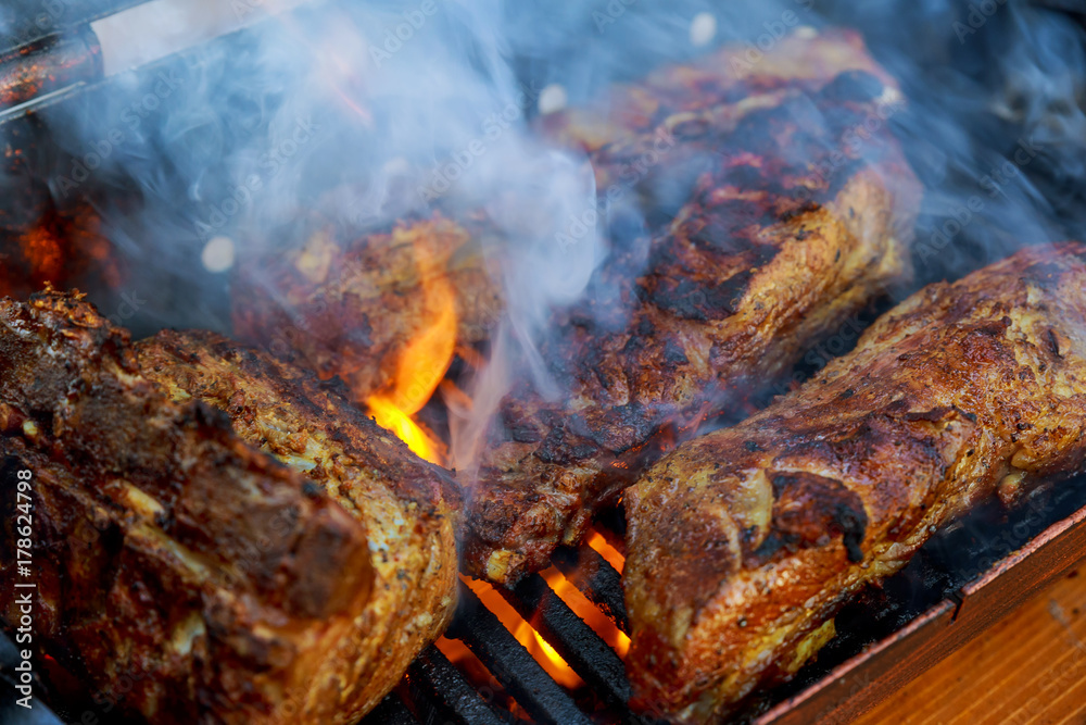 Grilled pork ribs on the grill. Grilled pork ribs on the grill.