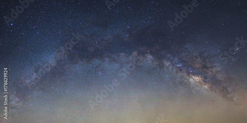 Panorama Milky way galaxy bridge as seen from thailand on a clear summer night.