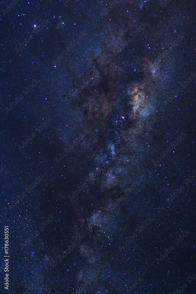 Starry night sky, Milky way galaxy with stars and space dust in the universe, Long exposure photograph, with grain. Starry night sky, Milky way galaxy with stars and space dust in the universe, Long exposure photograph, with grain.