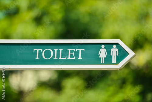 Toilet sign with blur background