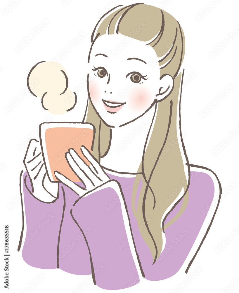 温かい飲み物を飲む女性 温かい飲み物を飲む女性