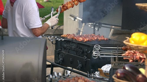 MOSCOW, RUSSIA, JULE 24, 2016: Pork Skewers Turning Automatically On Grill