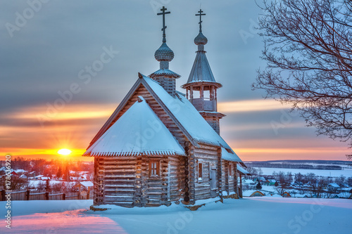 Small russian church at sunset in winter