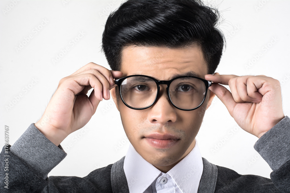 Young nerd student isolated on white background. Young nerd student isolated on white background.