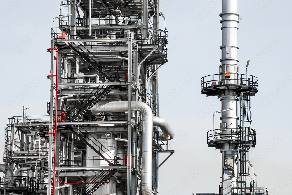 Industrial zone,The equipment of oil refining,Close-up of industrial pipelines of an oil-refinery plant,Detail of oil pipeline with valves in large oil refinery.