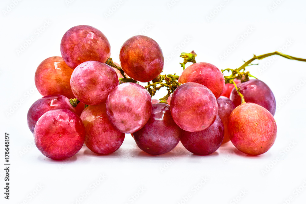 A bunch of fresh grapes isolated white background, fresh fruit concept A bunch of fresh grapes isolated white background, fresh fruit concept