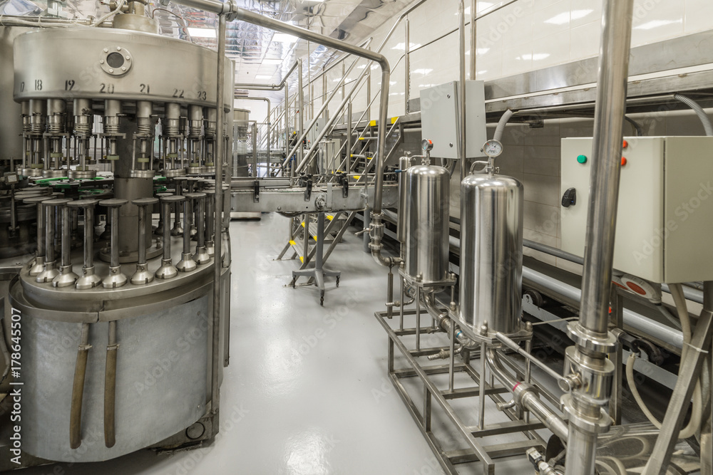 The shop for bottling beverages. Automatic filling line.