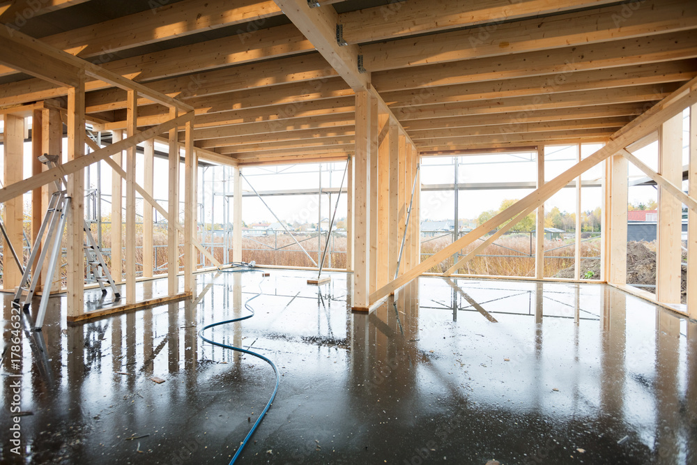 Fototapeta premium Wooden Incomplete Building With Wet Flooring