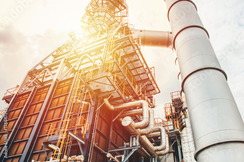 Industrial zone,The equipment of oil refining,Close-up of industrial pipelines of an oil-refinery plant,Detail of oil pipeline with valves in large oil refinery.