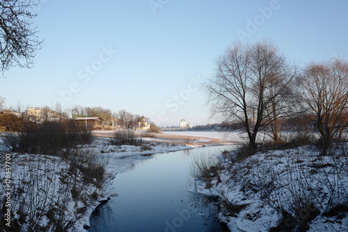 Fototapeta Naklejka Na Ścianę i Meble -  The Mirozhka River. In the background: River Velikaya. Pskov. Russia. 