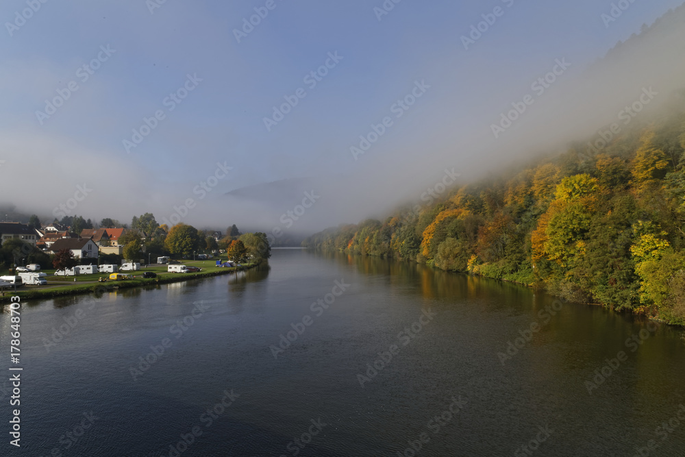 morning fog over the river Neckar in autumn