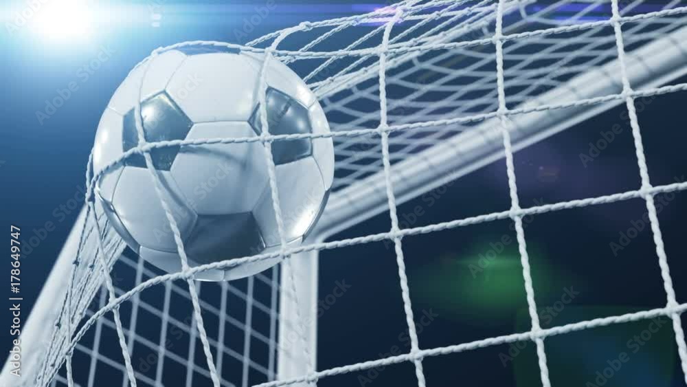 Soccer Ball flying in Goal Net and spinning in the Net in Slow Motion. Black Background and Flares. Sport Concept. Beautiful Football 3d animation of the Goal Moment. 4k Ultra HD 3840x2160.